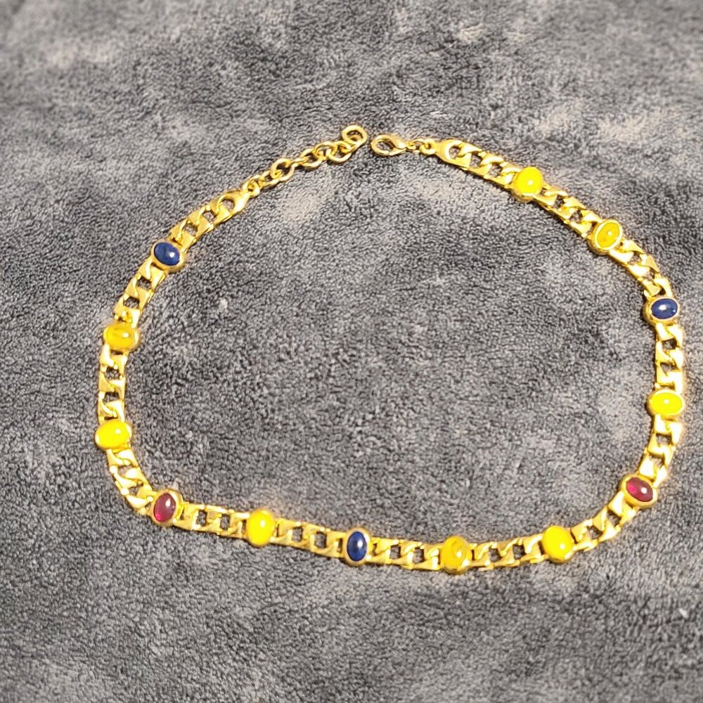 LIKE NEW gold toned Necklace with Cabochon gemstones.